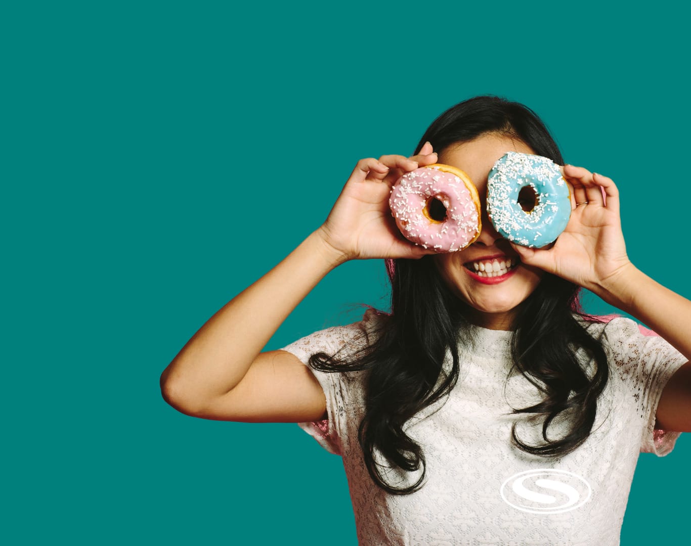 woman holding donuts over her eyes for the blog human-powered marketing header